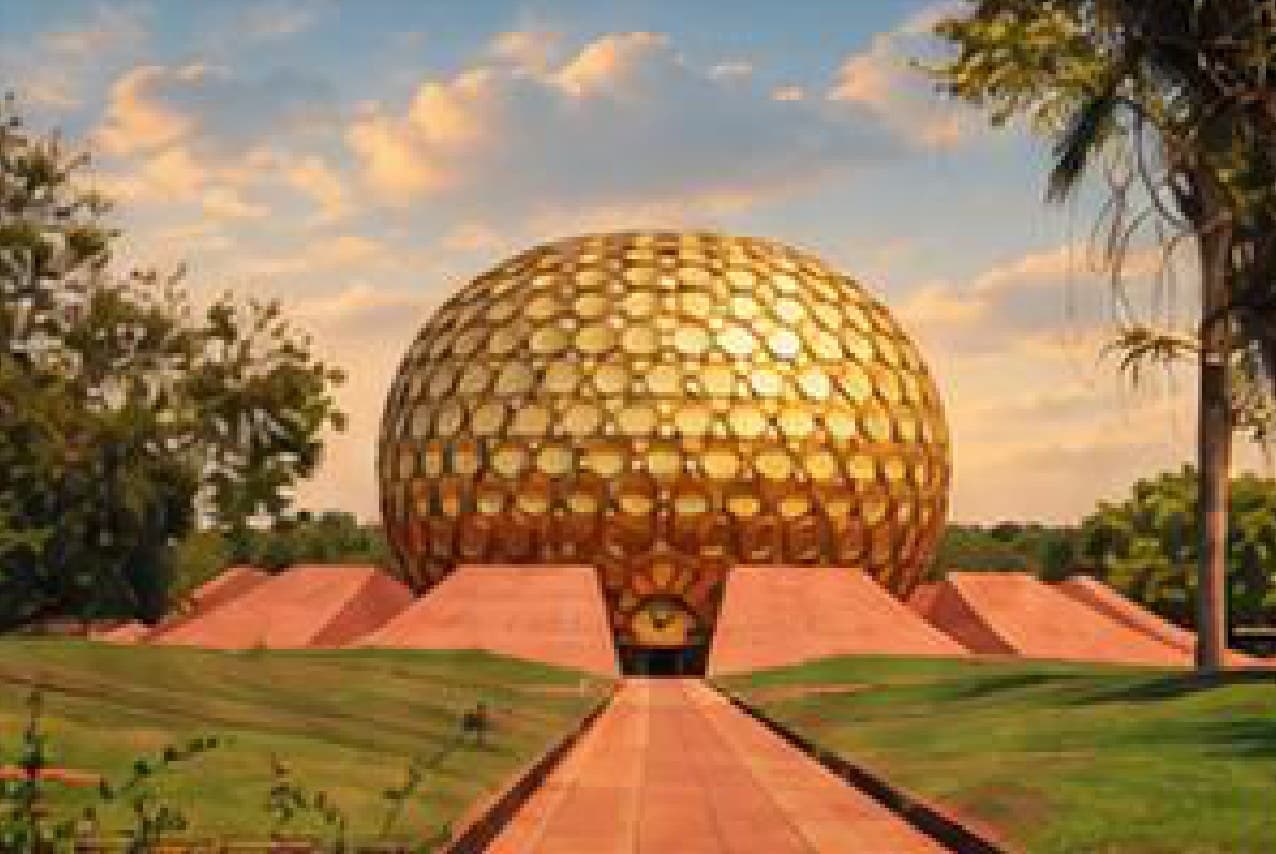 Matrimandir, Auroville's golden geodesic meditation dome set in landscaped gardens.
