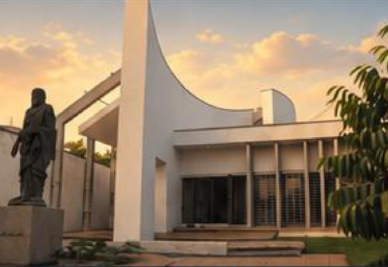 Savitri Bavan's sculptural white architecture and gardens in Auroville.
